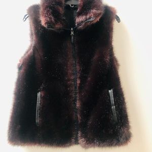 Faux fur vest in a deep plum color